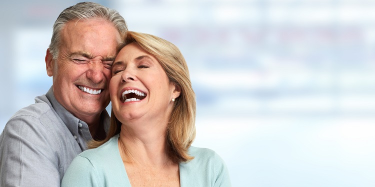 Happy Smiling Couple with Dentures